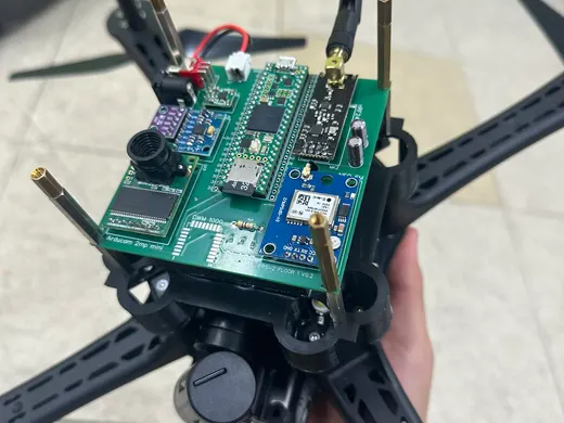 Close-up of a quadrotor frame and its onboard electronics.